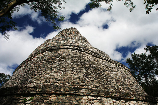 The Xaibe Pyramid stands at a mayor junction of limestone Maya roads