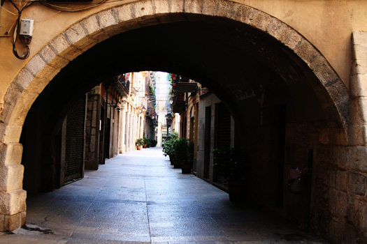 An ally running along the Rambla Llibertat in Girona's medieval city centre